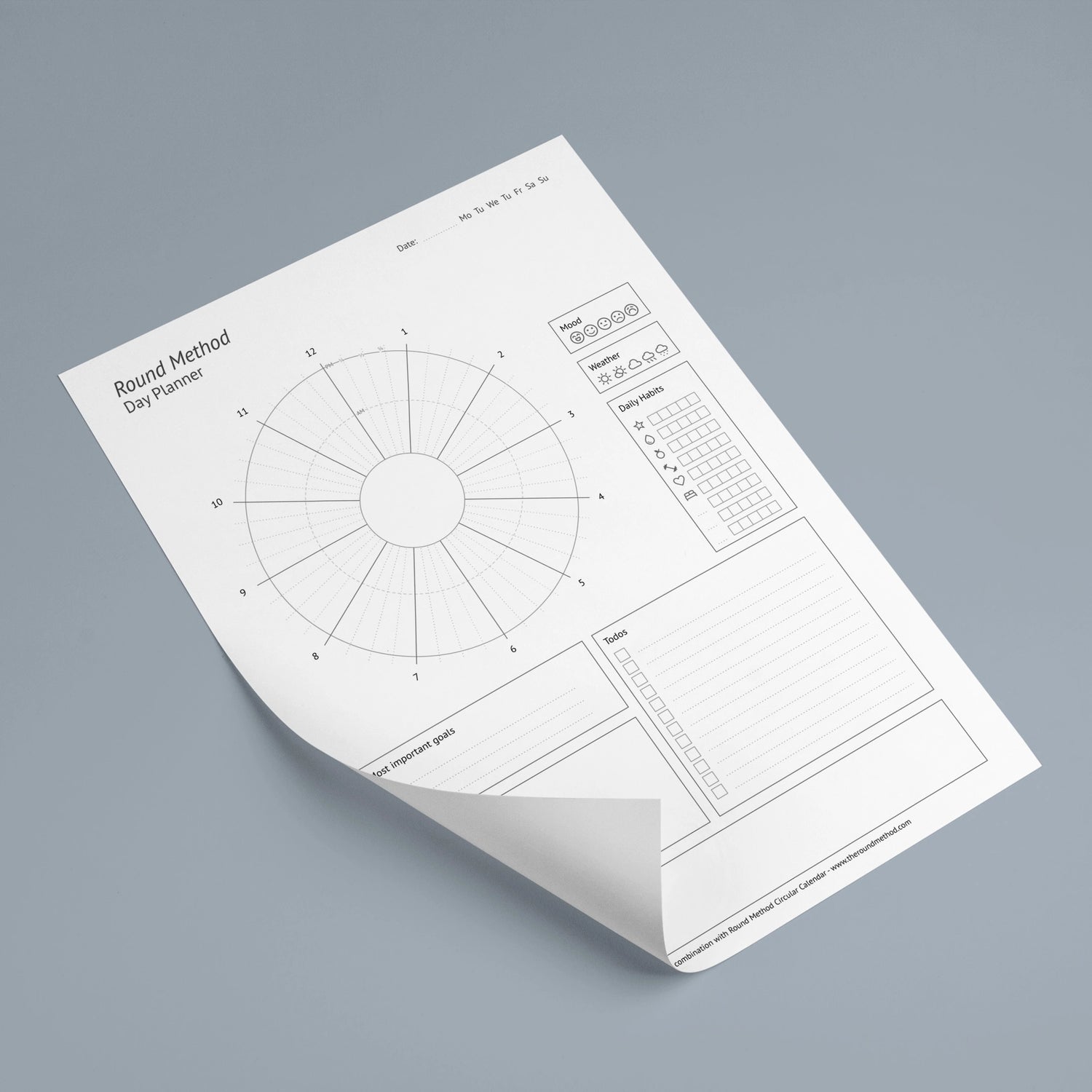 Picture of free printable daily planner in A4 or letter Format to fill out, track your progress and reach your goals